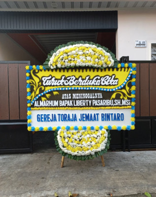 Papan Bunga Duka di Lantung